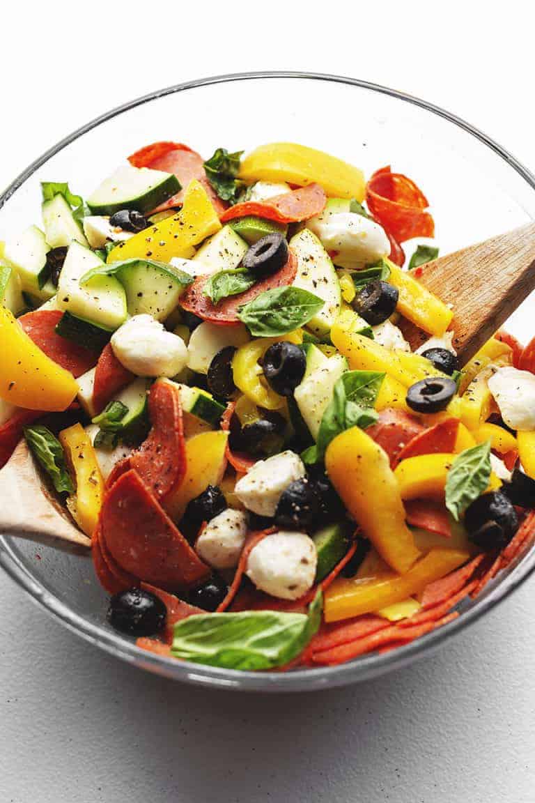 antipasto salad in a glass bowl