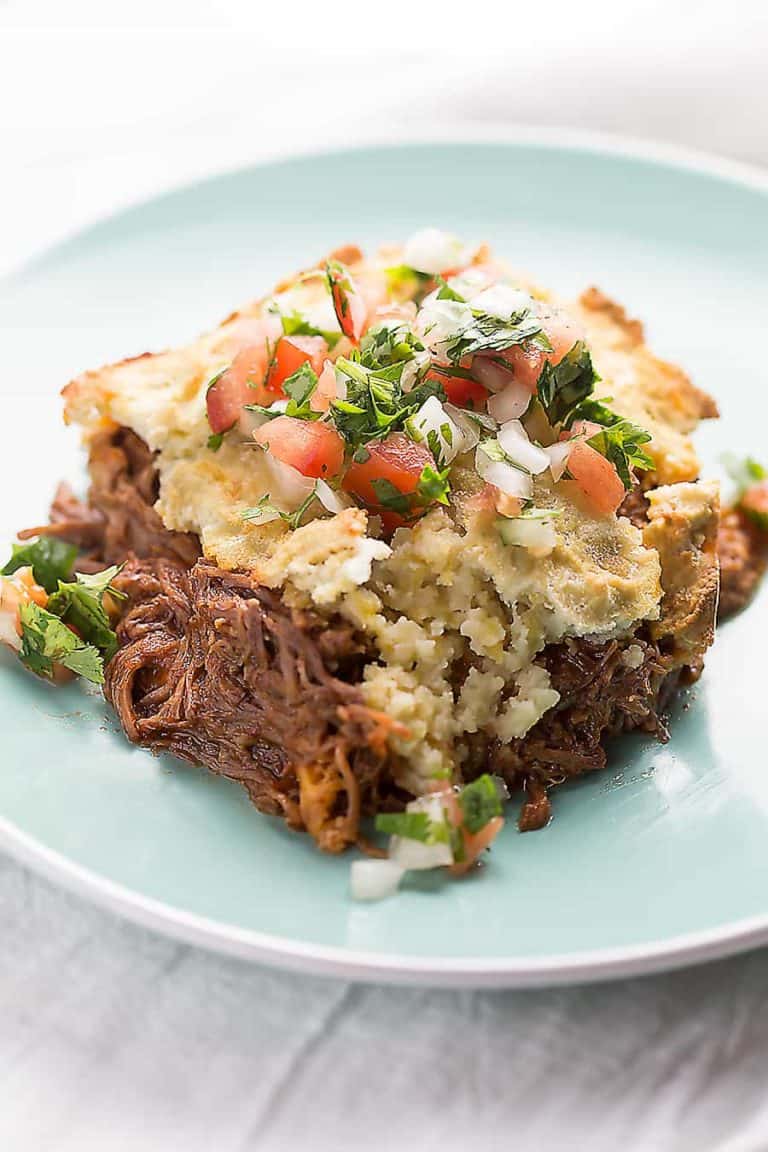 a serving of low carb tamale pie on a blue plate