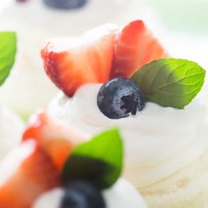 Impress everyone with this beautiful recipe of low carb mini pavlovas! Perfect for a Mother's Day dessert or just because!
