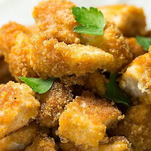 Crunchy pork rinds, smoky seasoning, and juicy chicken...these pork rind chicken nuggets are so flavorful and easy to make. My kids love them!