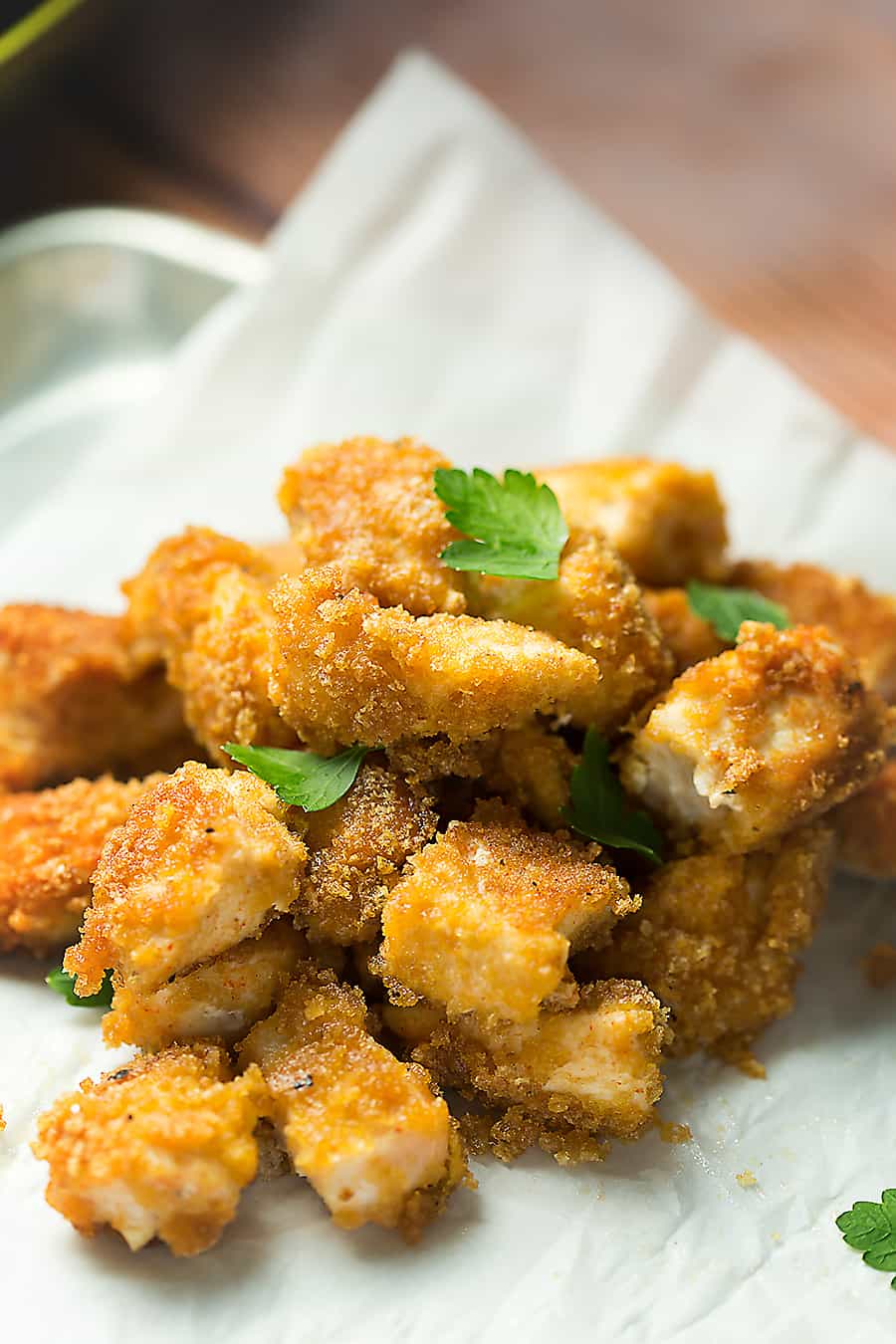 Crunchy pork rinds, smoky seasoning, and juicy chicken...these pork rind crusted chicken nuggets are so flavorful and easy to make. My kids love them!