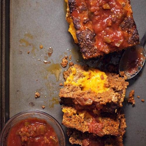 Mexican meatloaf on a sheet pan with salsa