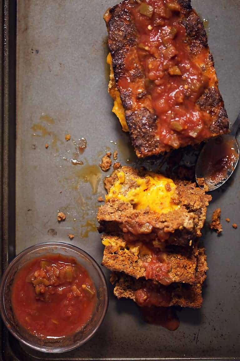 Mexican meatloaf on a sheet pan with salsa