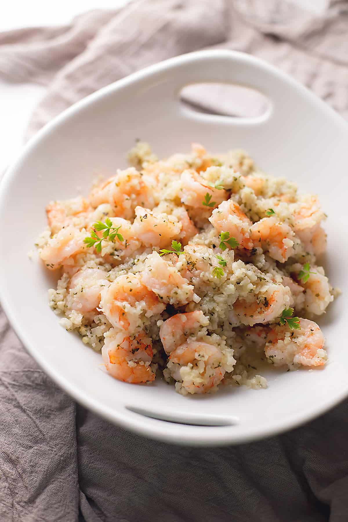 a bowl of shrimp and cauliflower rice