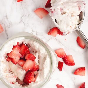 This creamy and decadent low carb no churn ice cream is easy to make with only a handful of ingredients.  It is a low carb dream come true!  I made mine strawberry cheesecake flavor and it is divine.  It is so rich and decadent, you can eat a few bites and be satisfied.