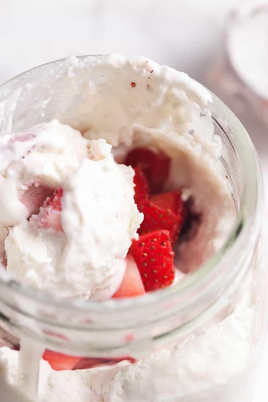 This creamy and decadent low carb no churn ice cream is easy to make with only a handful of ingredients.  It is a low carb dream come true!  I made mine strawberry cheesecake flavor and it is divine.  It is so rich and decadent, you can eat a few bites and be satisfied.