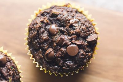 a close up of a low carb chocolate zucchini muffin