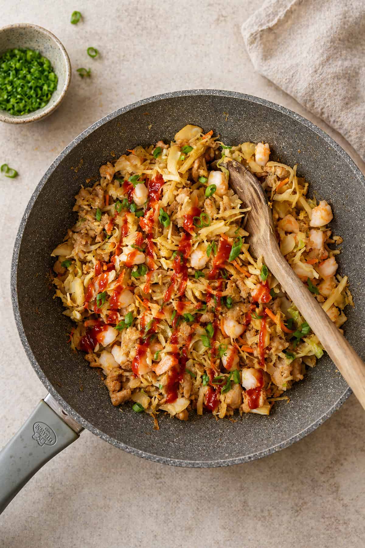 egg roll in a bowl in a skillet
