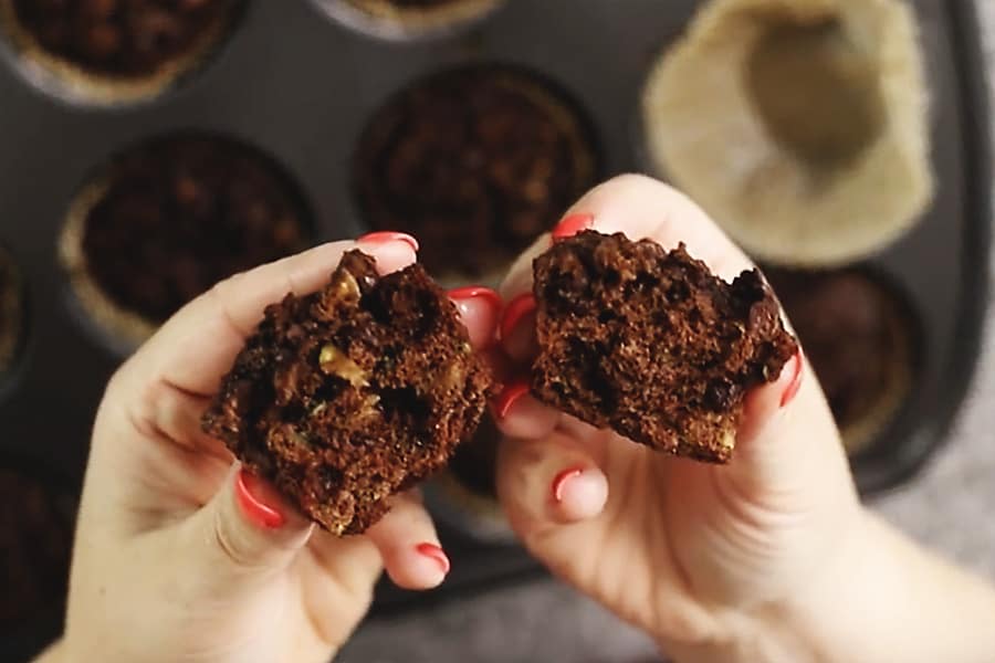 keto chocolate muffin broken in half to show the inside