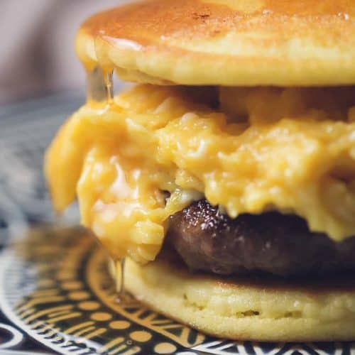 low carb breakfast sandwich dripping with sugar free maple syrup