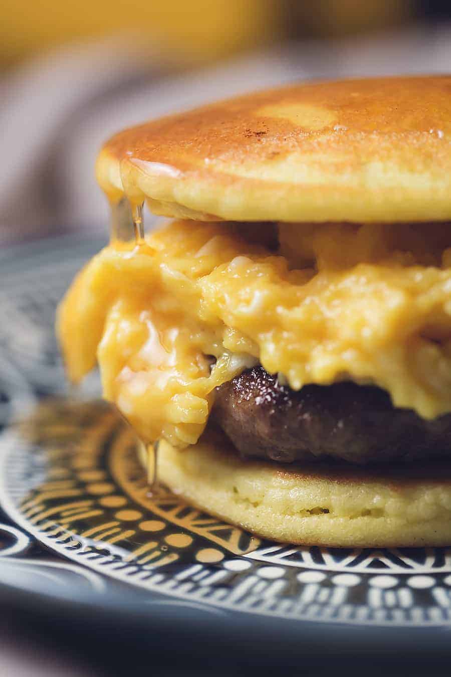 low carb breakfast sandwich dripping with sugar free maple syrup