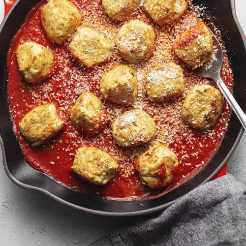 Chicken Parmesan Meatballs in a cast iron skillet
