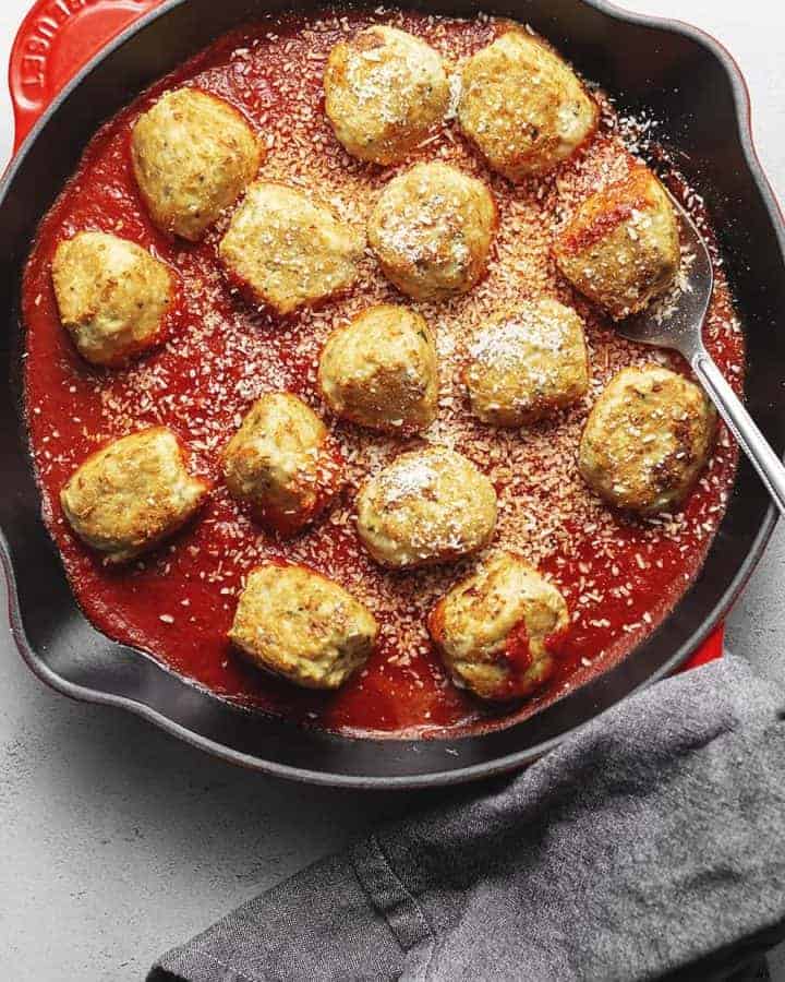Chicken Parmesan Meatballs in a cast iron skillet