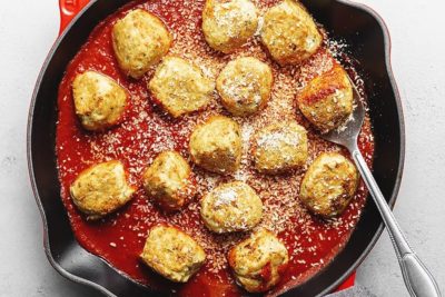 chicken parmesan meatballs in a skillet