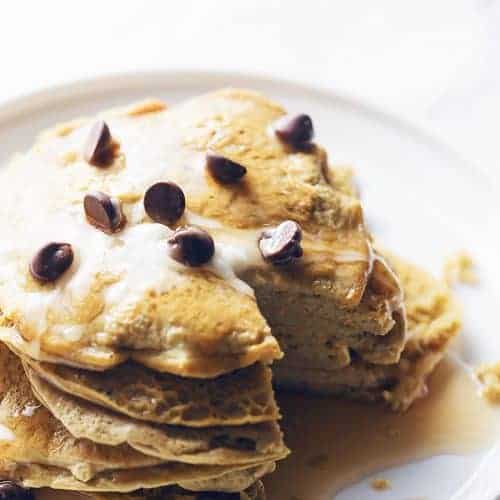 a stack of protein pancakes on a white plate
