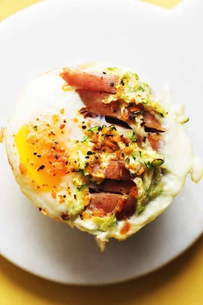 a single egg muffin cup on a white and yellow background