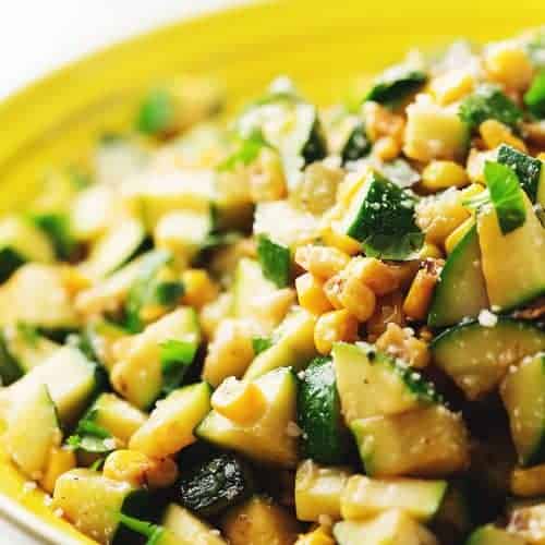 zucchini and corn in a yellow bowl