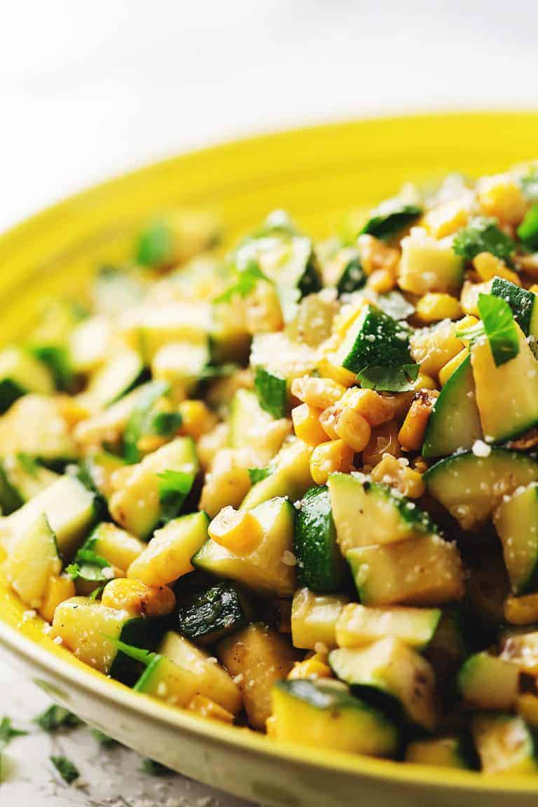 zucchini and corn in a yellow bowl