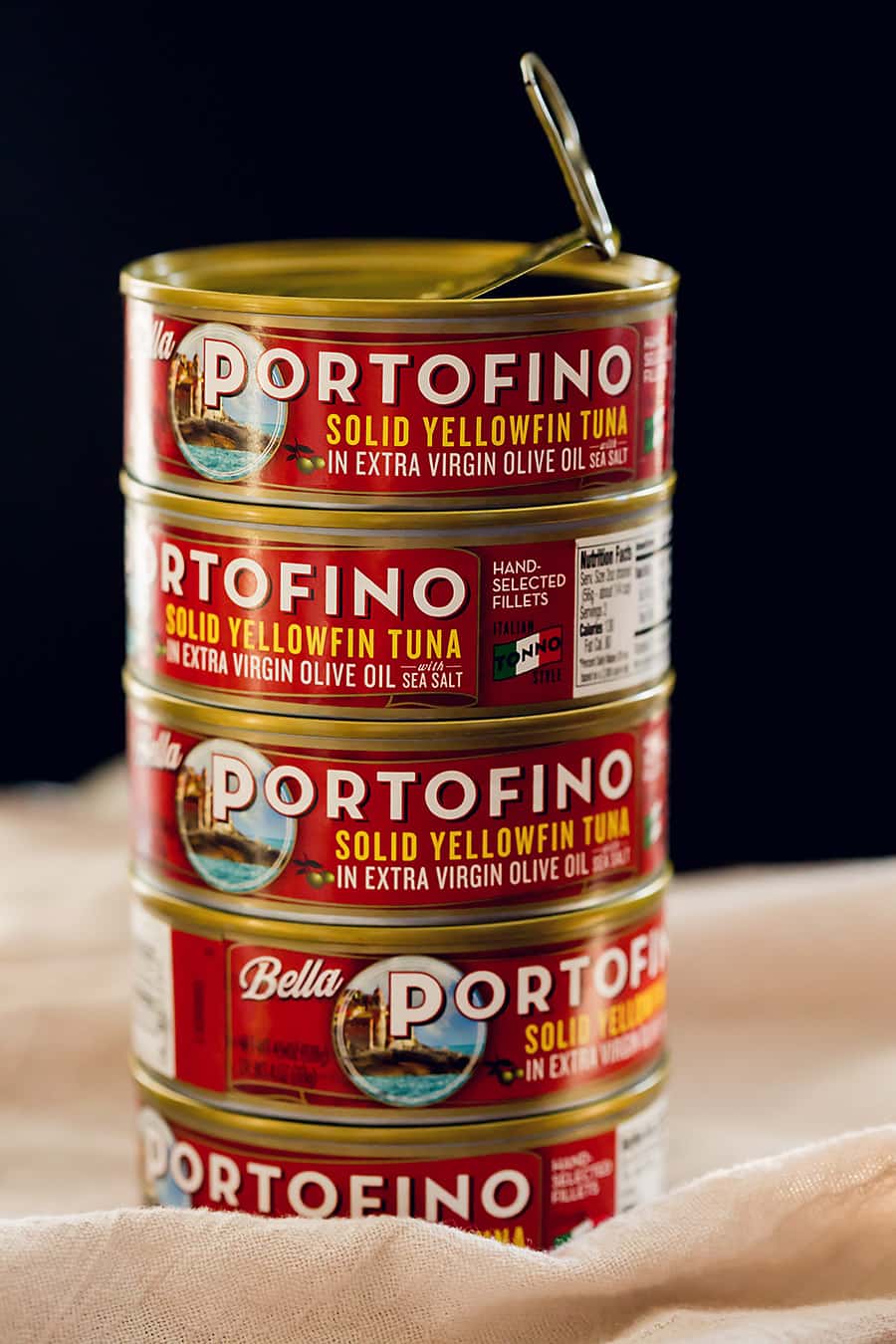 a stack of bella portofino pasta cans