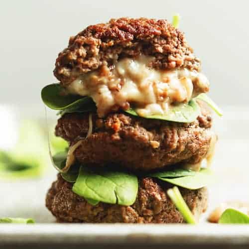 stuffed burgers stacked on top of each other