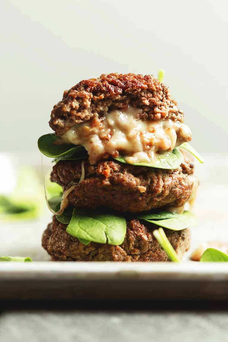 stuffed burgers stacked on top of each other