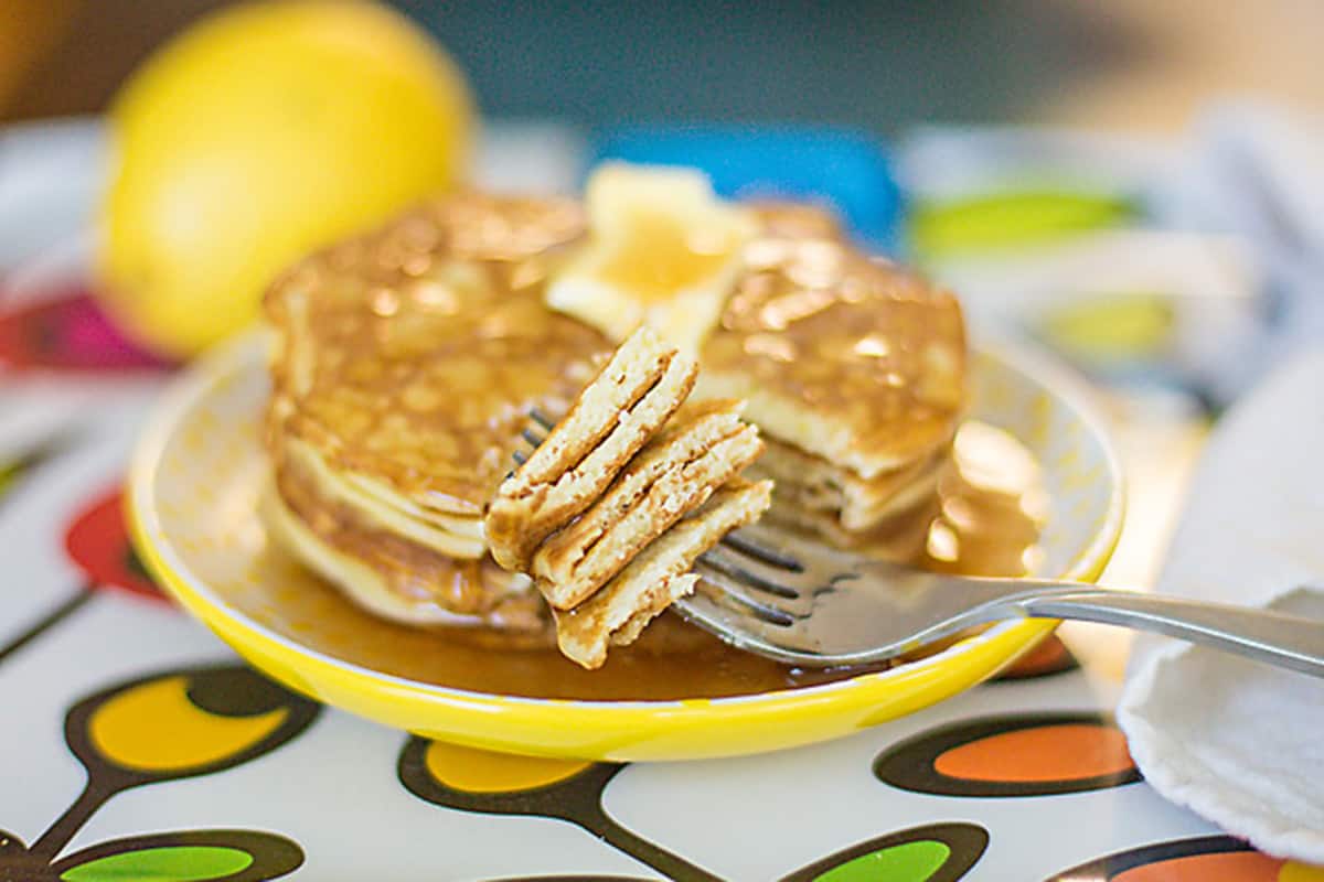 keto pancakes with lemon on a colorful plate