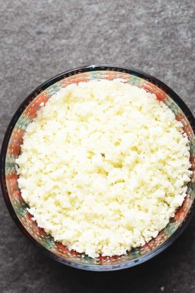 Fluffy cauliflower rice in a glass bowl