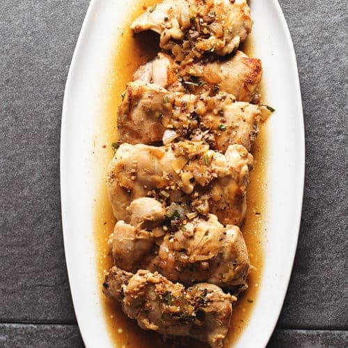 tuscan chicken on a white platter