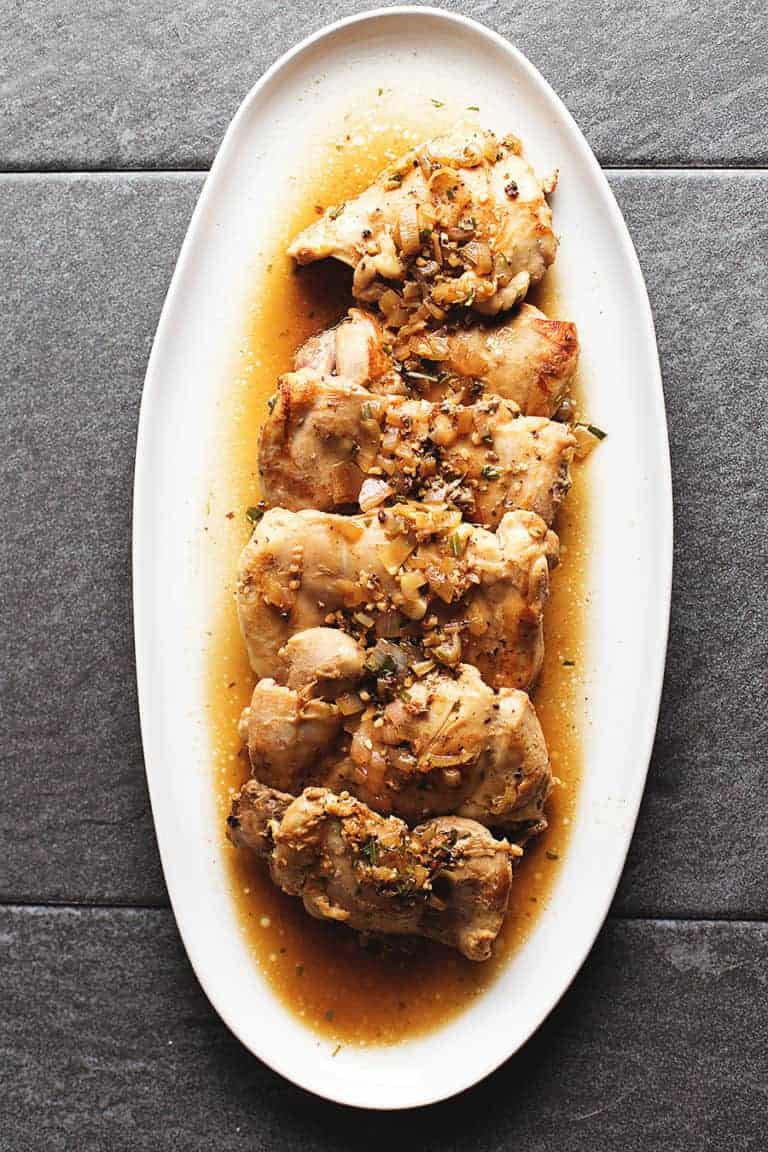 tuscan chicken on a white platter