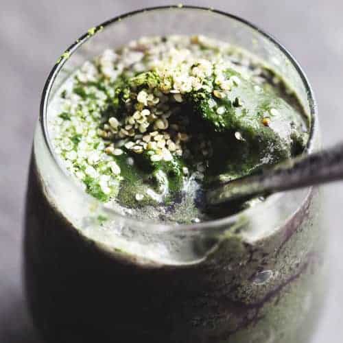 matcha smoothie with hemp hearts in a glass