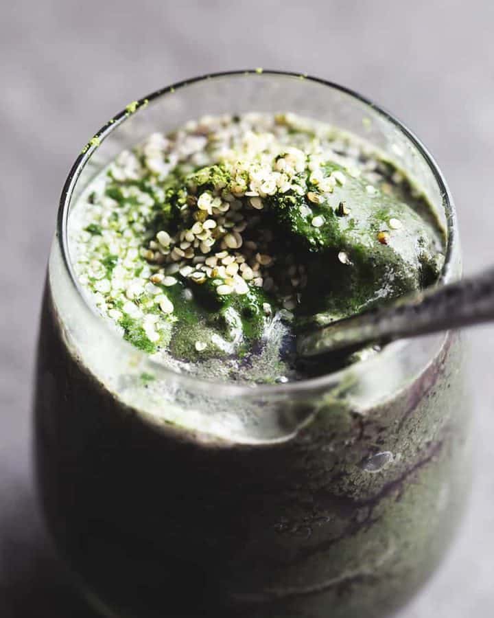 matcha smoothie with hemp hearts in a glass
