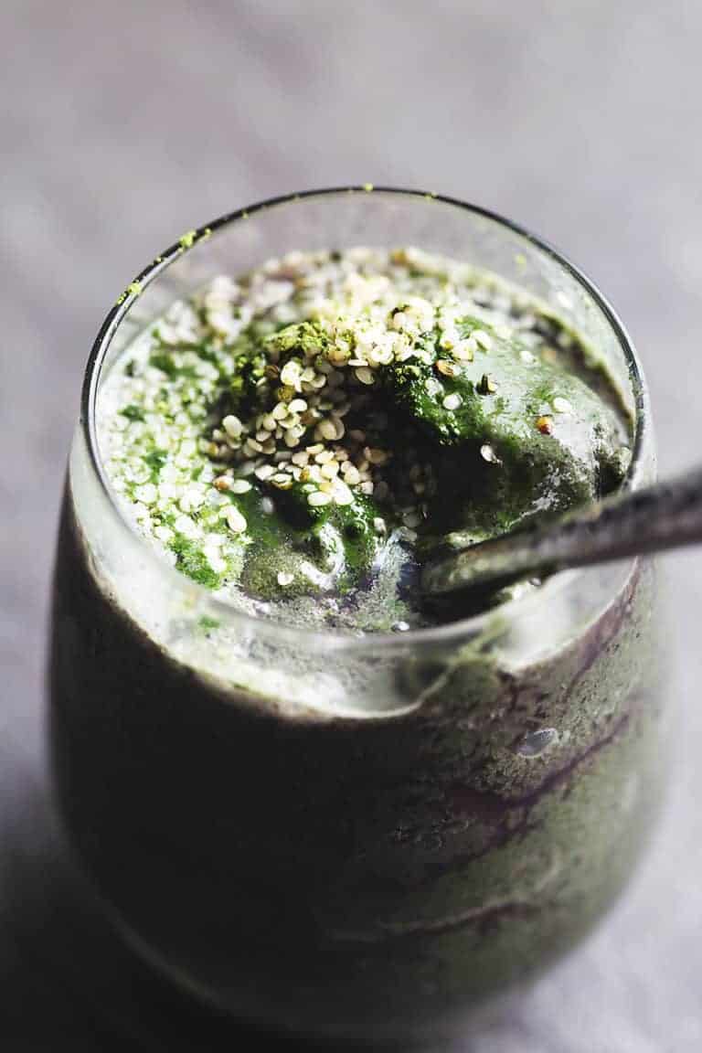 matcha smoothie with hemp hearts in a glass