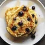 These are far and away the best keto pancakes I have ever made. Fluffy Pancakes made with coconut flour and filled with blueberries. Top with your favorite sugar free syrup for an amazing keto breakfast treat. #ketobreakfast #lowcarbrecipe #ketorecipe #keto #pancakes