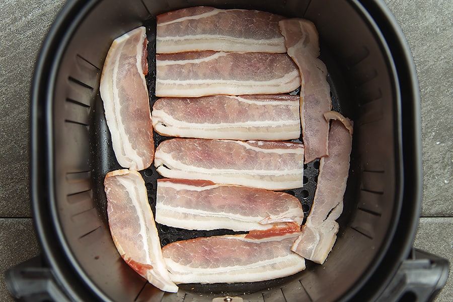 raw bacon in the air fryer basket