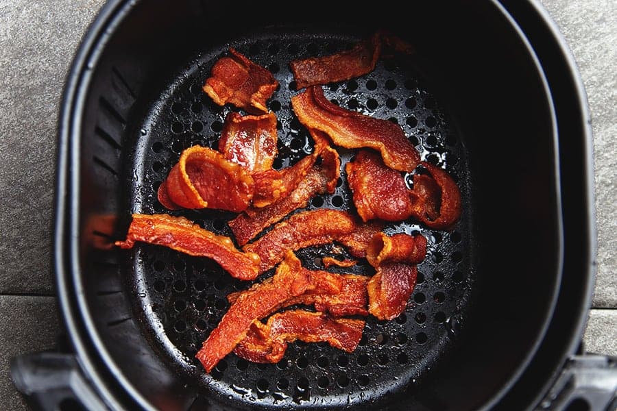 cooked bacon in the air fryer basket