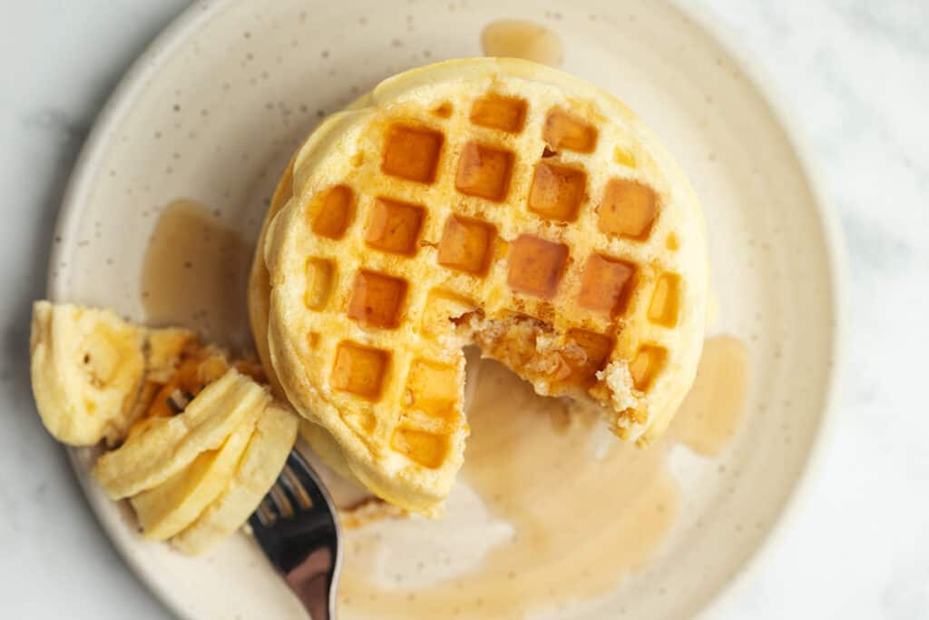 protein waffles on a plate with syrup