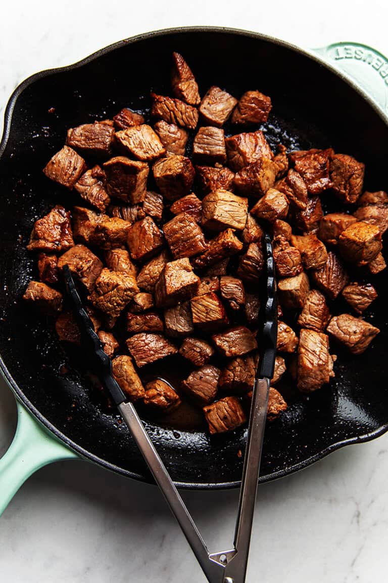steak tips cooked in a skillet