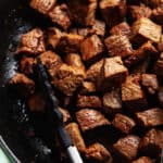 steak bites recipe with tongs