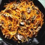 a skillet with butternut squash noodles