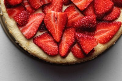 keto cheesecake decorated with strawberries