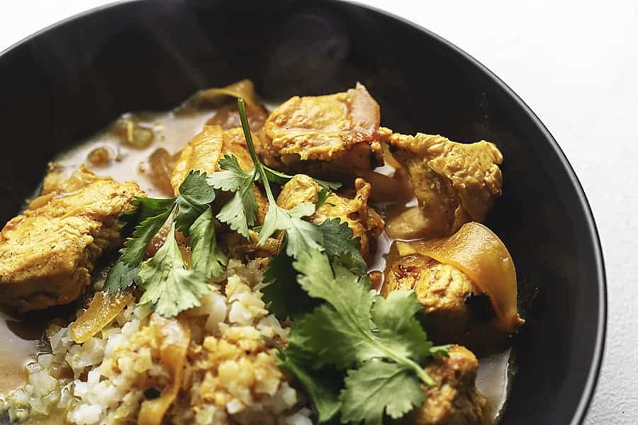easy Indian curry chicken in a black bowl