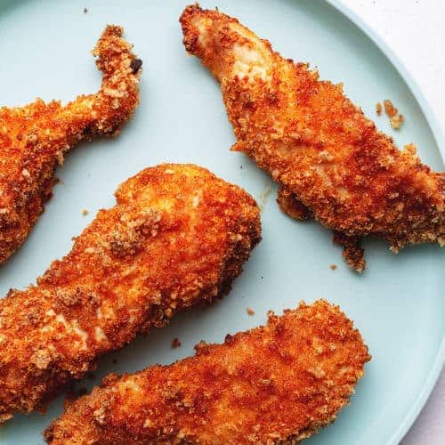 air fryer chicken tenders on a blue plate