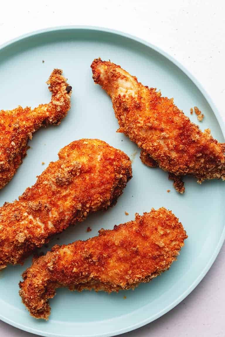 air fryer chicken tenders on a blue plate