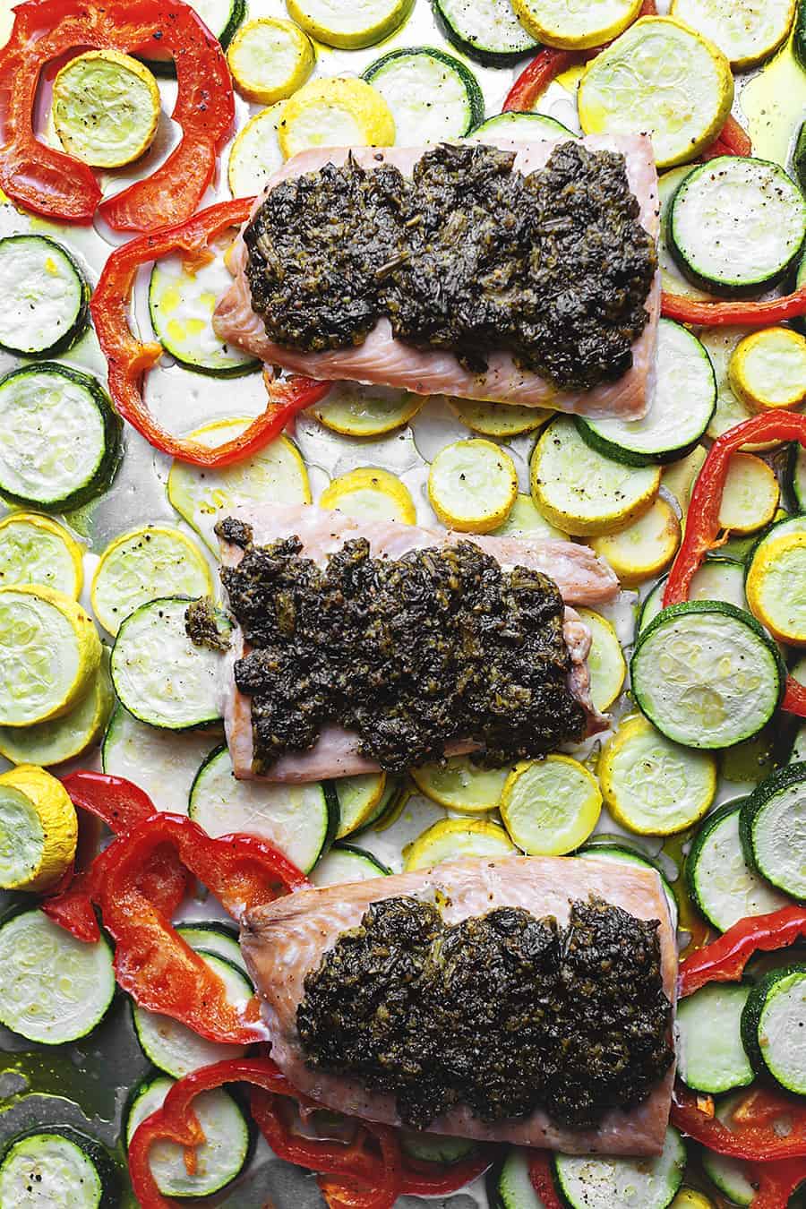 pesto salmon with veggies on a sheet pan