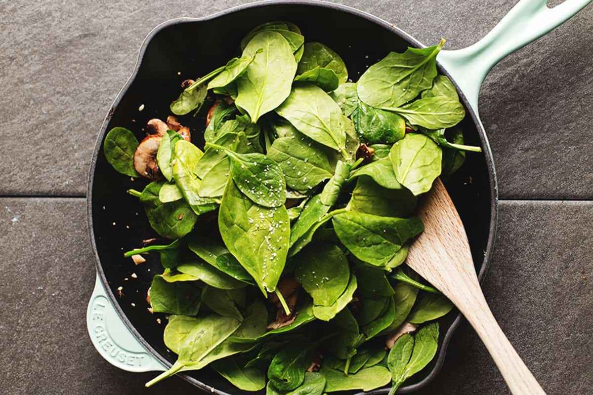 fresh spinach in a skillet