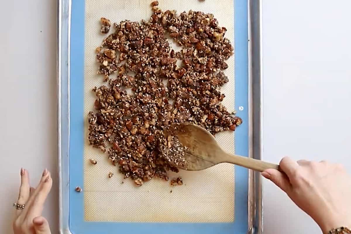keto granola spread onto a baking mat