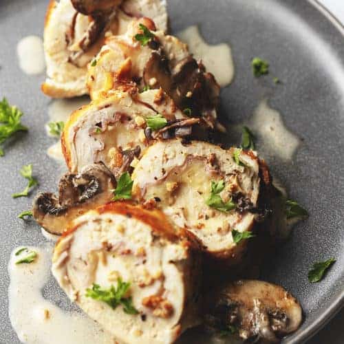 chicken rolls on a gray plate