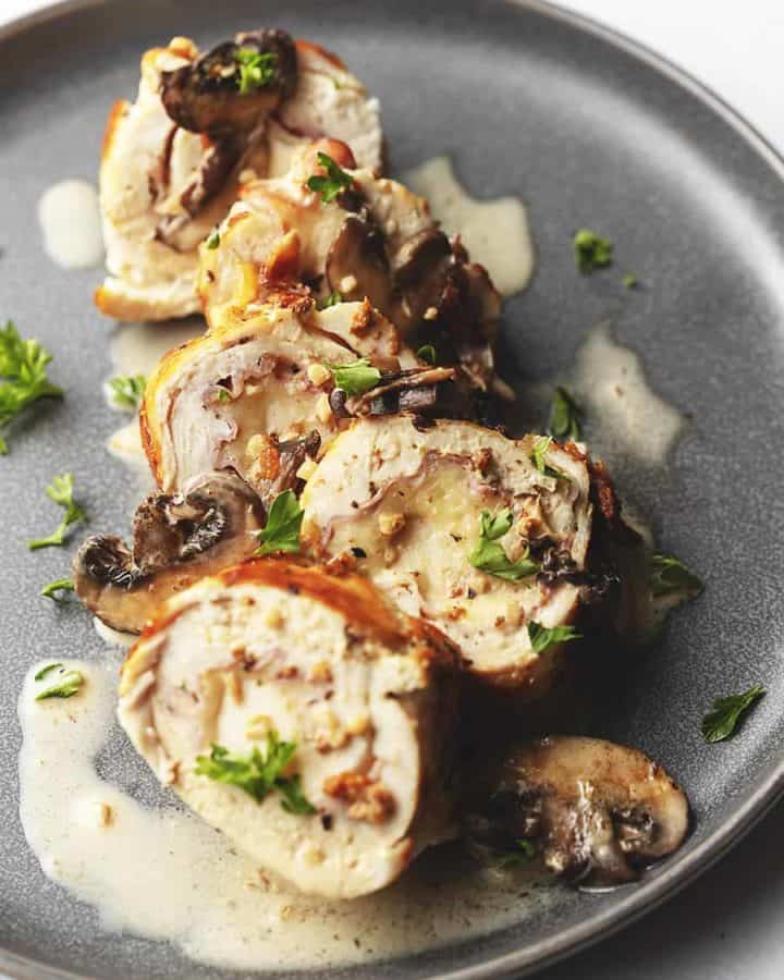 chicken rolls on a gray plate