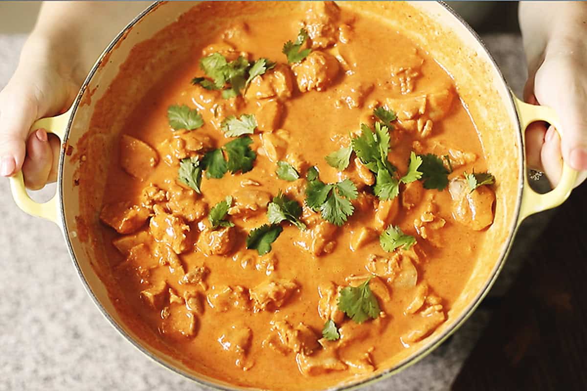 finished butter chicken in a skillet