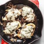 French onion smothered chicken in a skillet